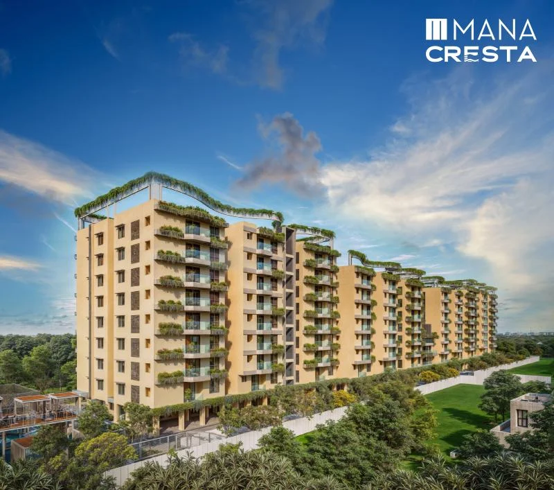 Mana Cresta eco-friendly apartments in Chikkanayakanahalli - Curvilinear architecture with nature-inspired design, EV charging stations, and sustainable living features
